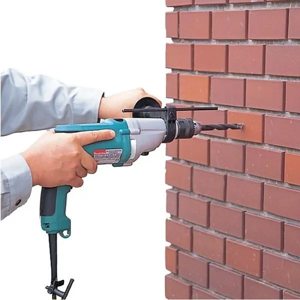 Двухскоростная ударная дрель Makita HP2050HJ 720 Вт, кейс Makpac