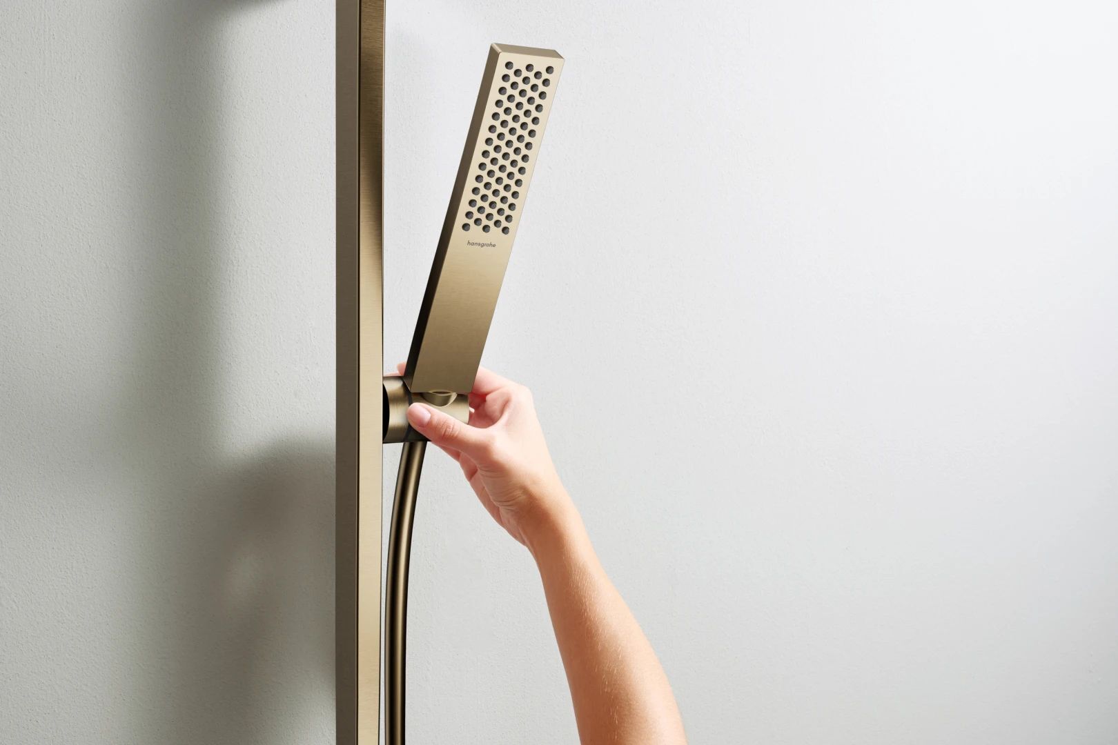 Душевая штанга Hansgrohe Unica E Puro 65 см + слайдер Easyslide + душевой шланг Isiflex 160 см, матовый коричневый (24404140)