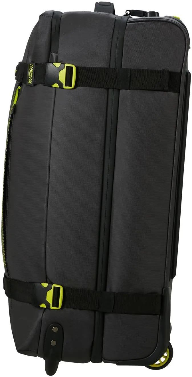 American Tourister Urban Track Duffle M Дорожная сумка чёрного цвета с неоновым лаймовым оттенком.